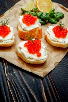 Canapes with red caviar Stock Photos