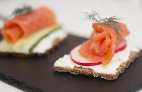 Canapes with salmon Stock Photos