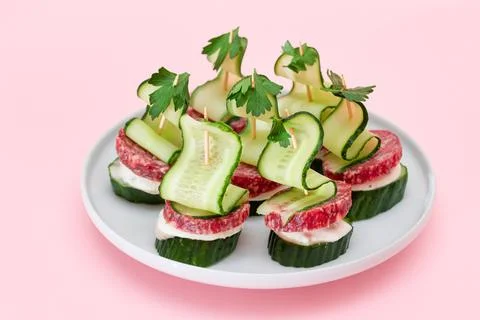 Canapes without Bread with Salami, Cucumber, Greens and Cream Cheese on Whi.. Stock Photos