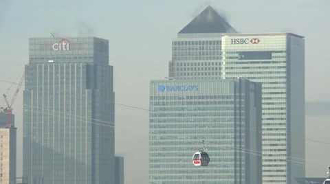 CANARY WHARF LONDON CABLE CAR HSBC BARCLAYS CITI BUILDING CLOSE UP Stock Footage