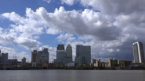 Canary Wharf under construction and Thames from Greenwich Peninsula, London, UK Stock Footage 112976300