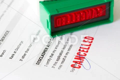 Cancelled letter rubber stamp on application form Stock Photos