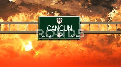 Cancun Mexico Highway Sign in the Sunset: Royalty Free #68008406