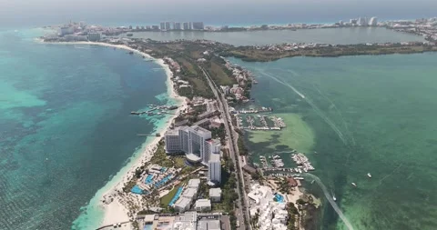 Cancuns hotel zone overlooking the lagoon and the beautiful beach Stock Footage 310866416