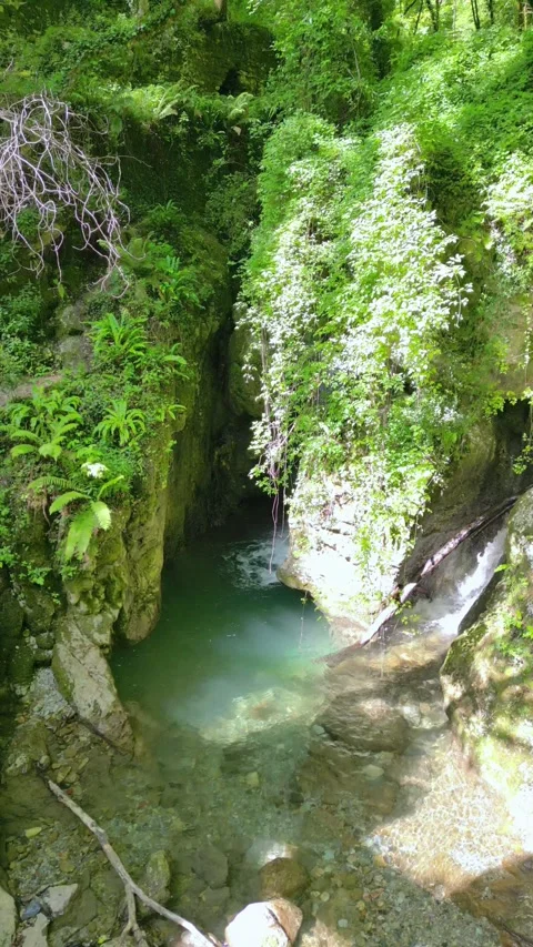 Candalla Falls Waterfall and Natural Pool Tuscany Italy Aerial Approach 4K Stock Footage 329054180