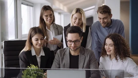 Candid creative busines team working in office and discussing start up ideas and Video stock 103108554