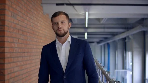 Candid man goes indoors Stock Footage 103095526