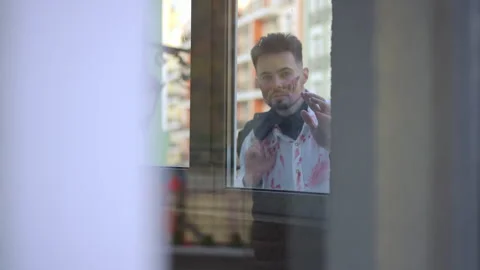 A Candid Moment of Deep Reflection Captured Through a Beautiful Window  Stock Footage 287934674