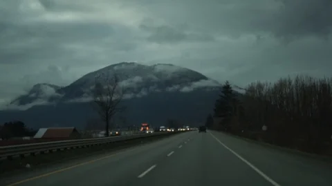 Candid open road in the mountains in cloudy British Columbia Stock-Footage 127476819