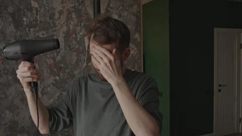 Candid shot capturing actor preparing in small apartment Stock-Footage 333332072
