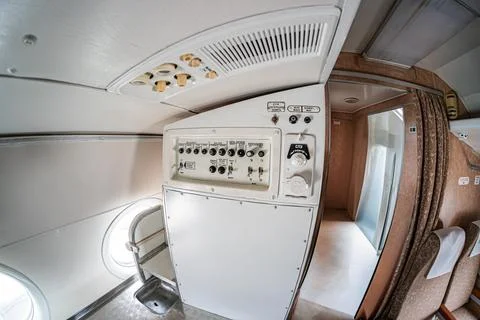A candid, utilitarian image showcasing an empty passenger airplanespacecraf.. Stock Photos