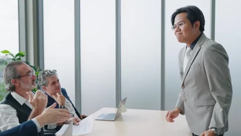 Candidate man giving resume shaking hands with human resource for job interview. Stock Footage 249242934