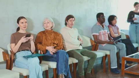 Candidates of different ages are waiting for an interview in the office. People Stock Footage 331303578