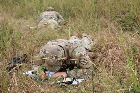 Candidates plot points on their map during the Land Nav Course.  Fotos de archivo
