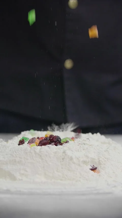 Candied Fruit and Raisins Falling Into Flour for Baking Dough Vidéo 341417502