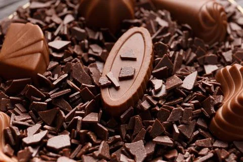 Candies in chocolate chips close-up macro photography. Stock Photos