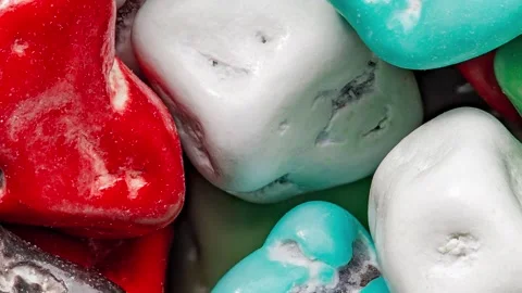 Candies in multicolored icing sugar, irregular 動画素材 255033771