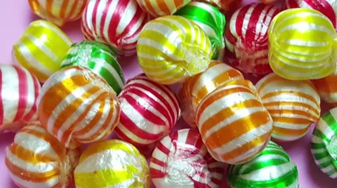 Candies on Pink Background Stock Footage 63617844