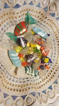 Candies on a plate Stock Photos