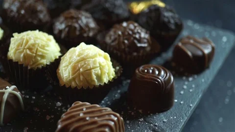 Candies variety on turntable Stock Footage 75761576