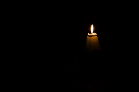 Candl in the dark. Foto stock