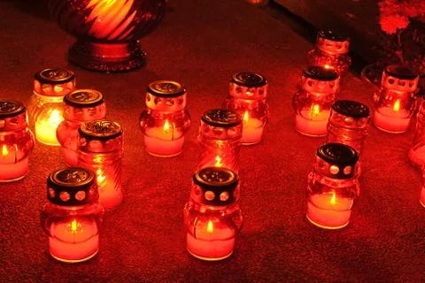 Candlas on grave Stock Photos