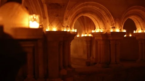 Candle on abbey arches Stock Footage 77268236
