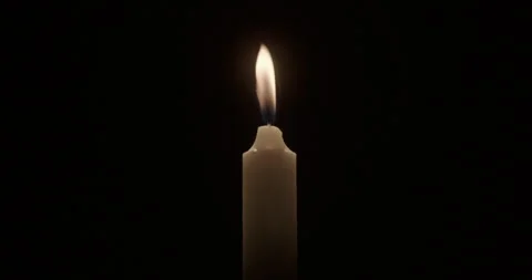 Candle against dark background. Stock Footage 327118158