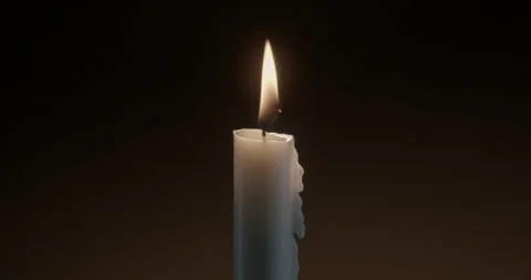 Candle against dark background. Stock Footage 327118705