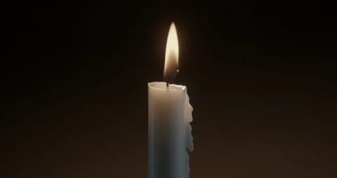 Candle against dark background. Stock Footage 327118717