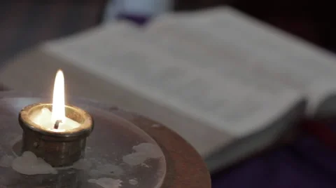 Candle and bible Stock Footage 51730596