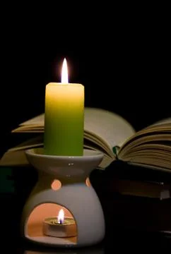 Candle and book 스톡 사진