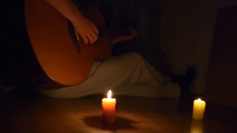 Candle and guitar Stock Footage 81202242
