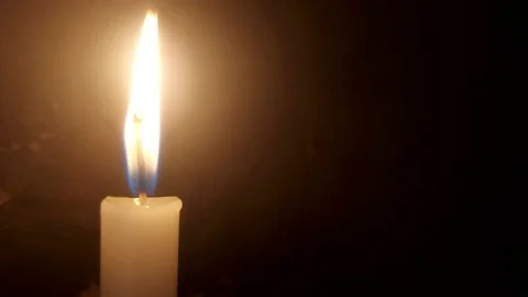 A candle and its flame burning. Video stock 154703933