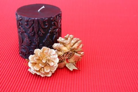Candle and Pine Cones Stock Photos