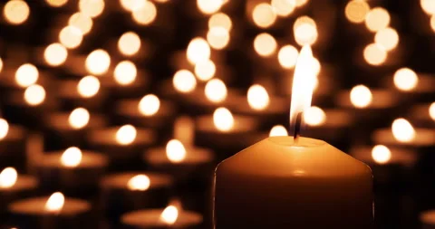 Candle and Small Lights in the Background 4K Stock Footage 103513264