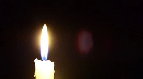 Candle and wind, blinking flame Stock Footage 48842261