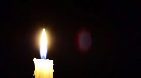 Candle and wind, blinking flame Stock Footage 48855833