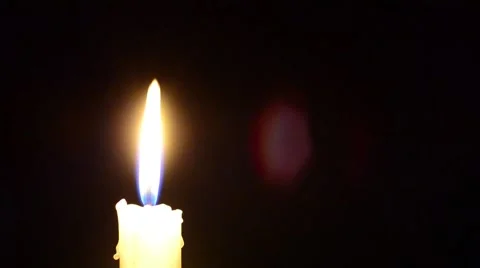 Candle and wind, blinking flame Stock Footage 48855844