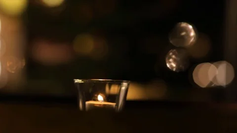 The candle on the background of the Christmas tree. Stock Footage 70073702