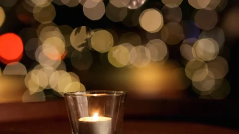The candle on the background of the Christmas tree. Stock Footage 70073865