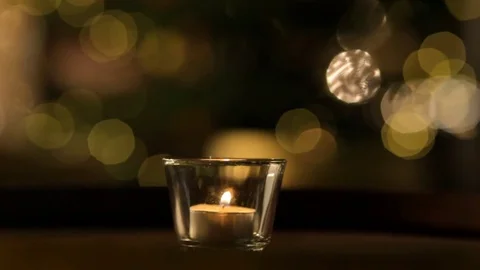 The candle on the background of the Christmas tree. Stock Footage 70073867