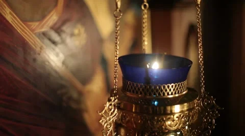 Candle in the background of the icon Stock Footage 60400652