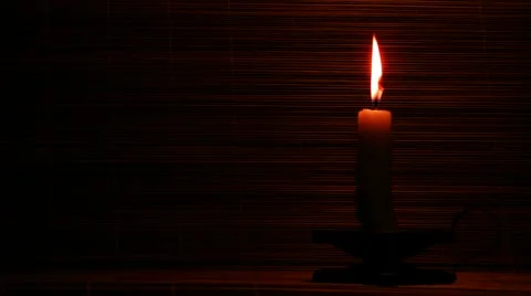 Candle in the background mat Stock Footage 988053