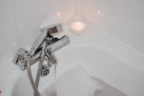 Candle in bathroom Stock Photos
