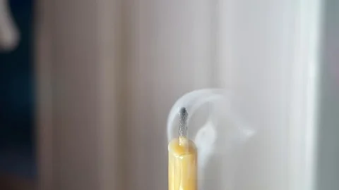 Candle being blown out. Slow motion, close up Stock Footage 121046827