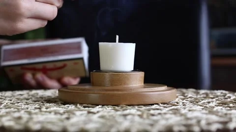 Candle being lit closeup Stock Footage 62943747