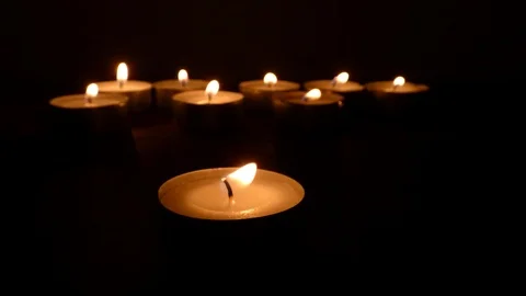Candle on a black background. black background and blowing candle out. Anothe Stock Footage 105032198
