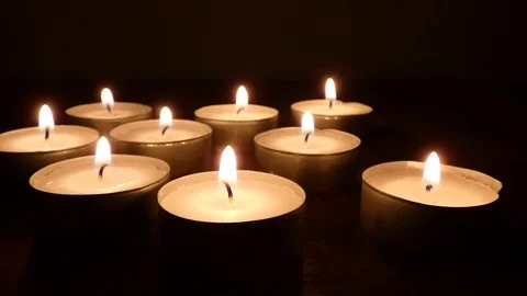 Candle on a black background. black background and blowing candle out. Anothe Stock Footage 105032263