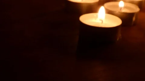 Candle on a black background. black background and blowing candle out... Stock Footage 105032359